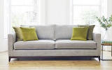 Darlings grey sofa with green scatter cushions